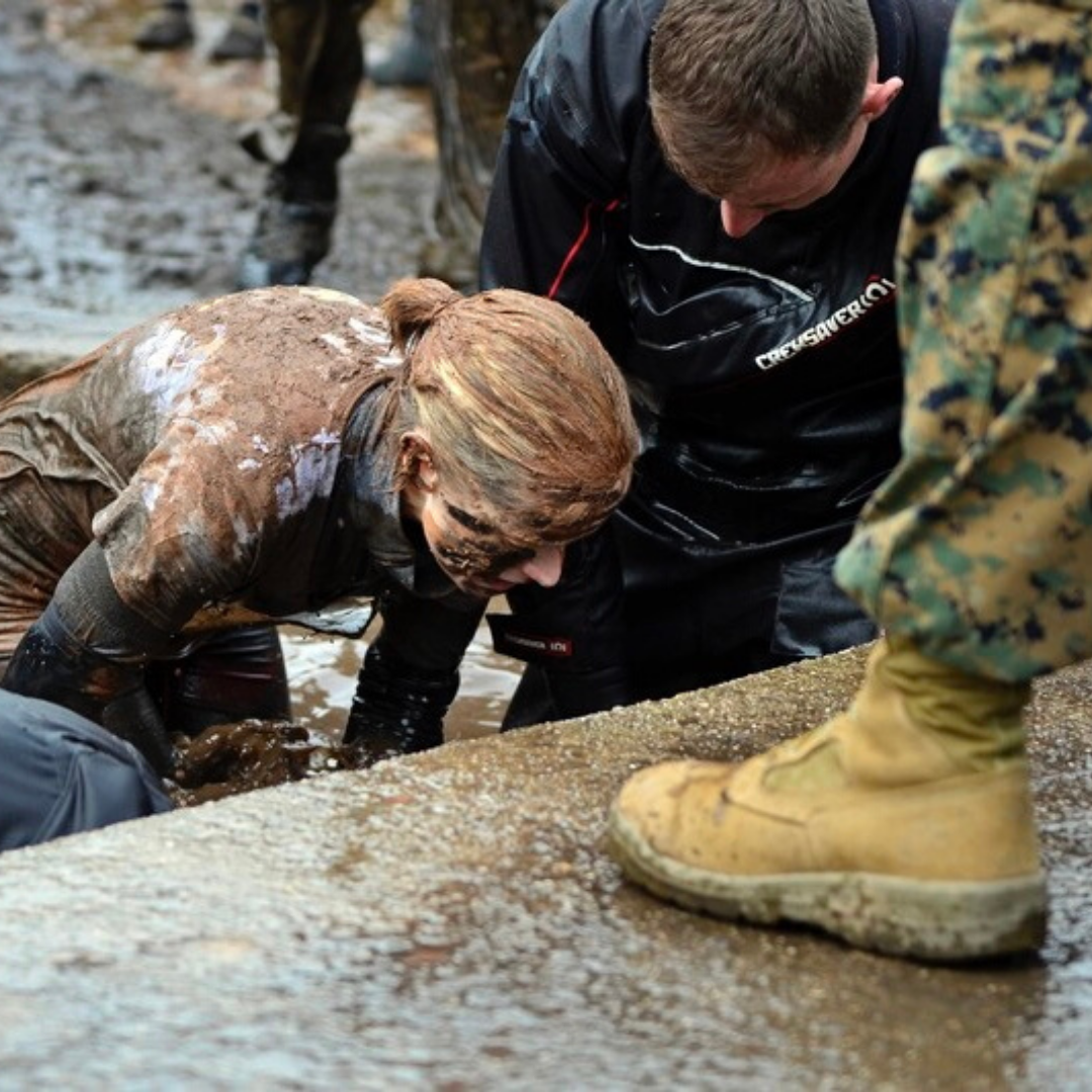 Picture of Claire Rogers Transformation Coach completing the Royal Marines Commando Challenge Sheep Dip Obstacle