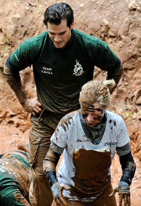 Picture of Henry Cavill Actor and Claire Rogers Transformation Coach completing Royal Marines Commando Challenge Obstacle